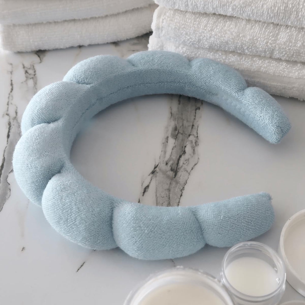 HitModa headband in use while washing face, keeps hair back