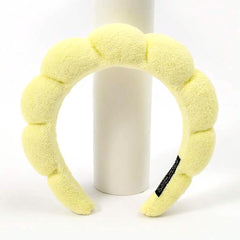 HitModa headband worn while washing face demonstrating secure hold and convenience
