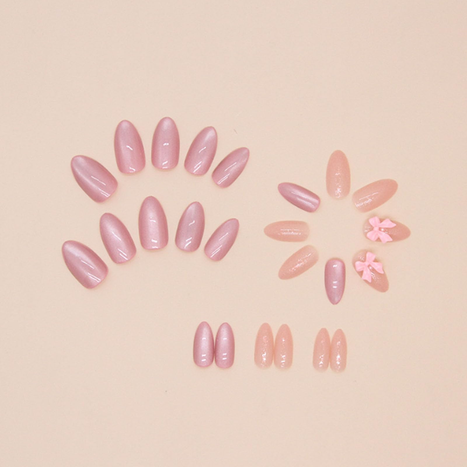 Hkanlre close-up of medium bow detail on almond nail highlighting cute design