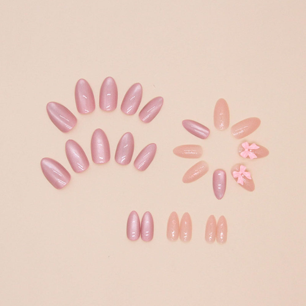 Hkanlre close-up of medium bow detail on almond nail highlighting cute design