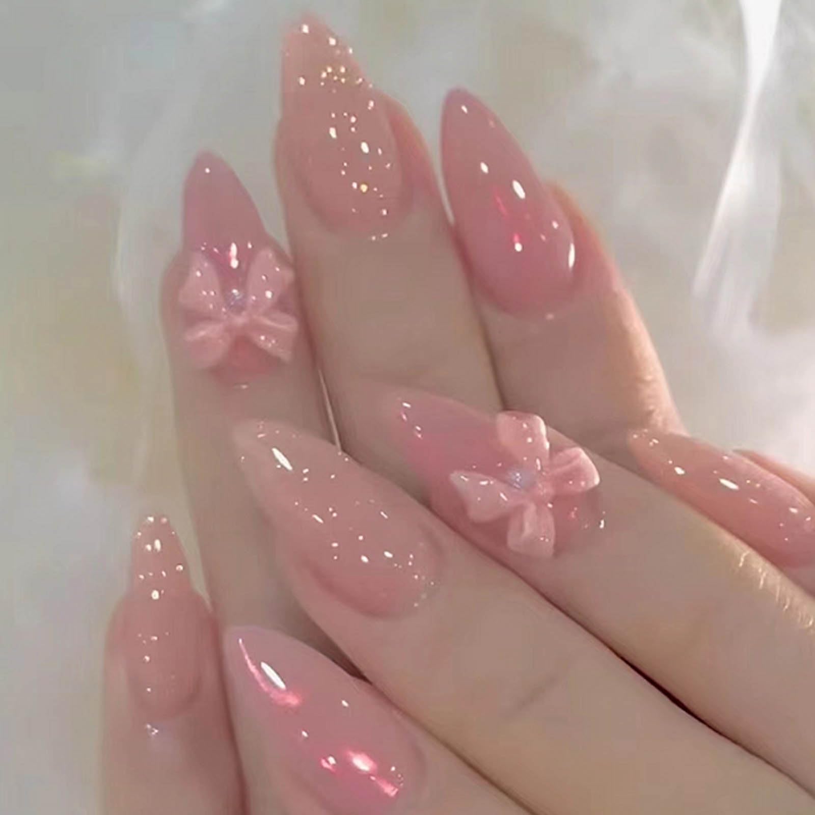 Hkanlre front packaging showing 24PCS pink bow nails for instant manicure