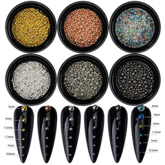 HNUIX beads applied on acrylic nail demonstrating precise placement and enhanced metallic accent