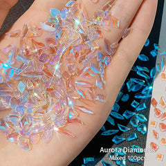 HNUIX front packaging displaying 100 mixed-shape aurora crystals for versatile nail art