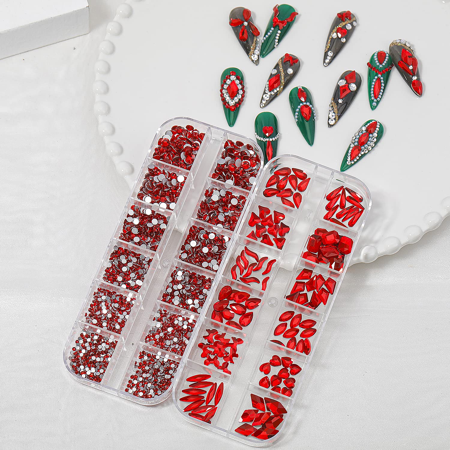 HNUIX red rhinestones applied on nails displaying vibrant sparkle and dimension