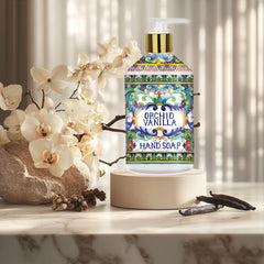 Home & Body Company Orchid Vanilla bottle next to sink, indicates generous size