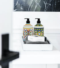 Home & Body Company Perugia Deruta olive thyme bottle close-up showing herbaceous label for subtle, warm fragrance