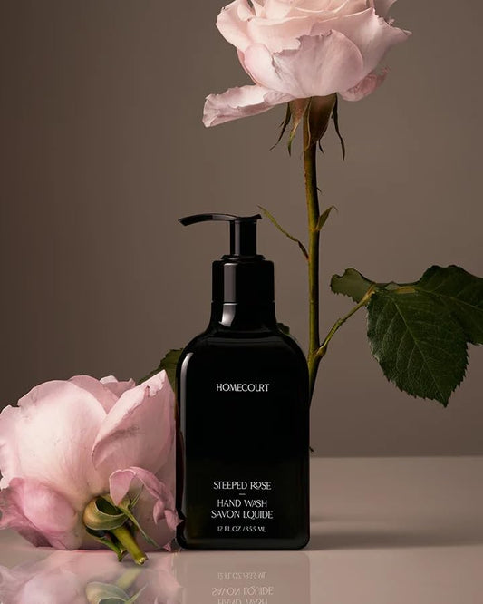 Homecourt bottle front label showing Steeped Rose and benefits