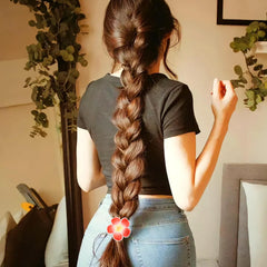 Honbay flower hair tie in a high ponytail, decorative and secure styling