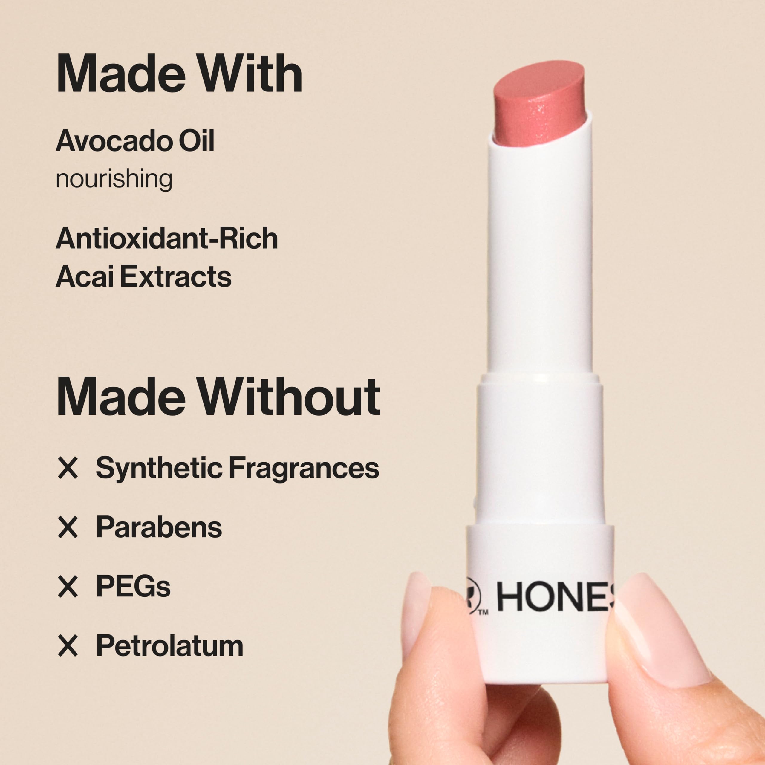 Honest Beauty Plum Drop open tube angled to show product core and easy application benefit
