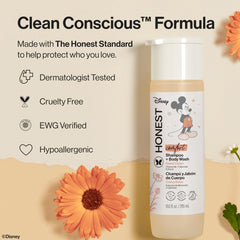 The Honest Company bottle in a children's bath setting illustrating easy head-to-toe use
