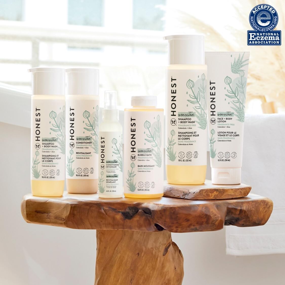 Adult with defined curls refreshed by The Honest Company detangler for smoothness benefit