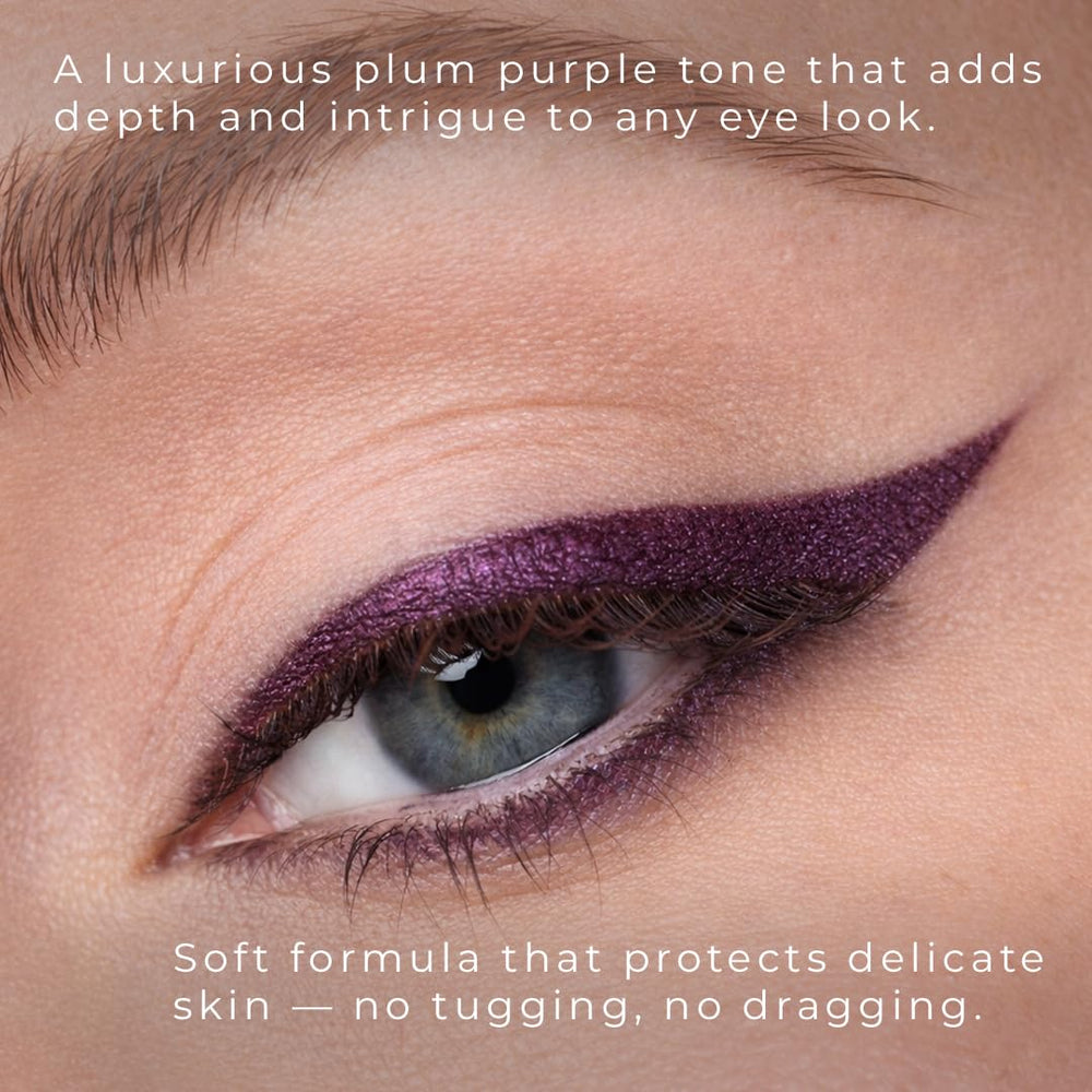 Honeybee Gardens Passion pigment stroke on skin showing rich plum payoff and smooth glide