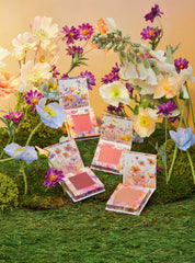 Honeybee Gardens Primrose surrounded by botanicals representing sunflower oil jojoba oil and vitamin E benefits