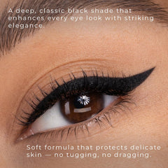Honeybee Gardens swatch on skin showing rich Jet Set Black pigment and true-to-color payoff