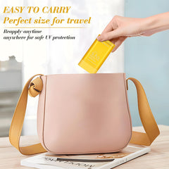 Honeyouth stick beside a hand to show 16g size and convenient portability
