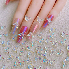 HONGCAUP butterfly charm on acrylic manicure highlights iridescent sparkle benefit