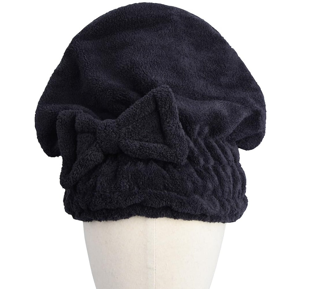 HOPESHINE cap in use on woman wrapping hair to reduce drying time and frizz