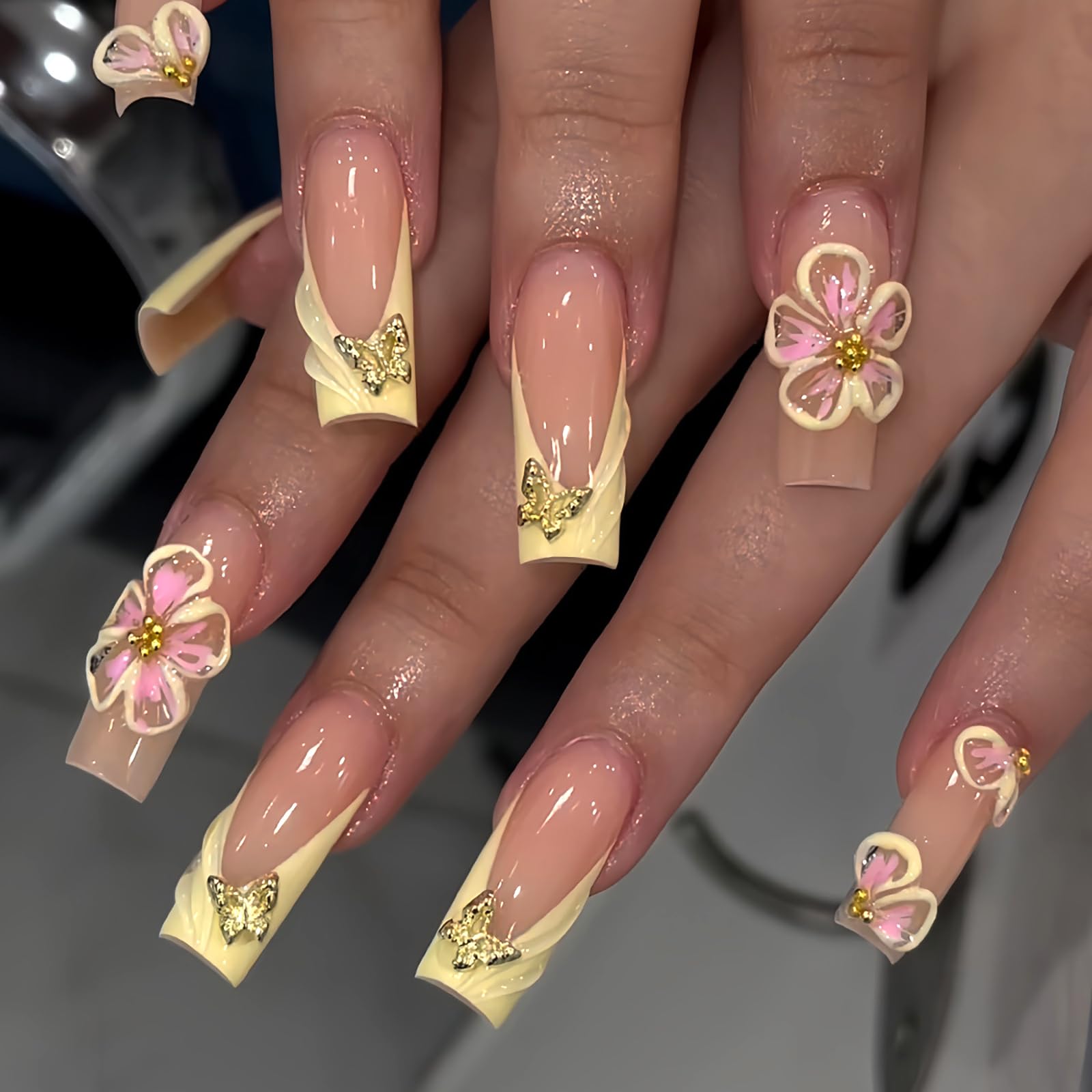 HOSAILY front packaging showing butter yellow 3D daisy nails and contents for instant style
