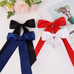 Hotalisona bow styled in outdoor portrait adding a photogenic accessory