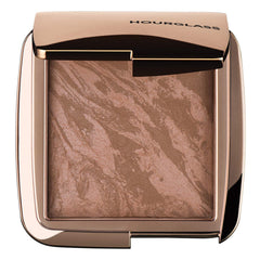 Hourglass compact front view showing sleek packaging and bronzer benefit