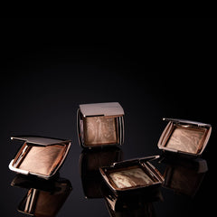Close-up of Hourglass bronzer pan showing textured finish and blendability