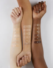Multiple arm swatches of Hourglass Veil showing shade range and buildable, natural coverage
