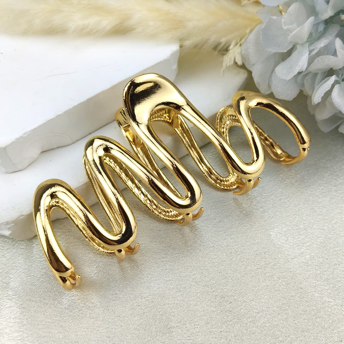 HOXIEYA clip side profile highlighting curved shape for decorative styling benefit
