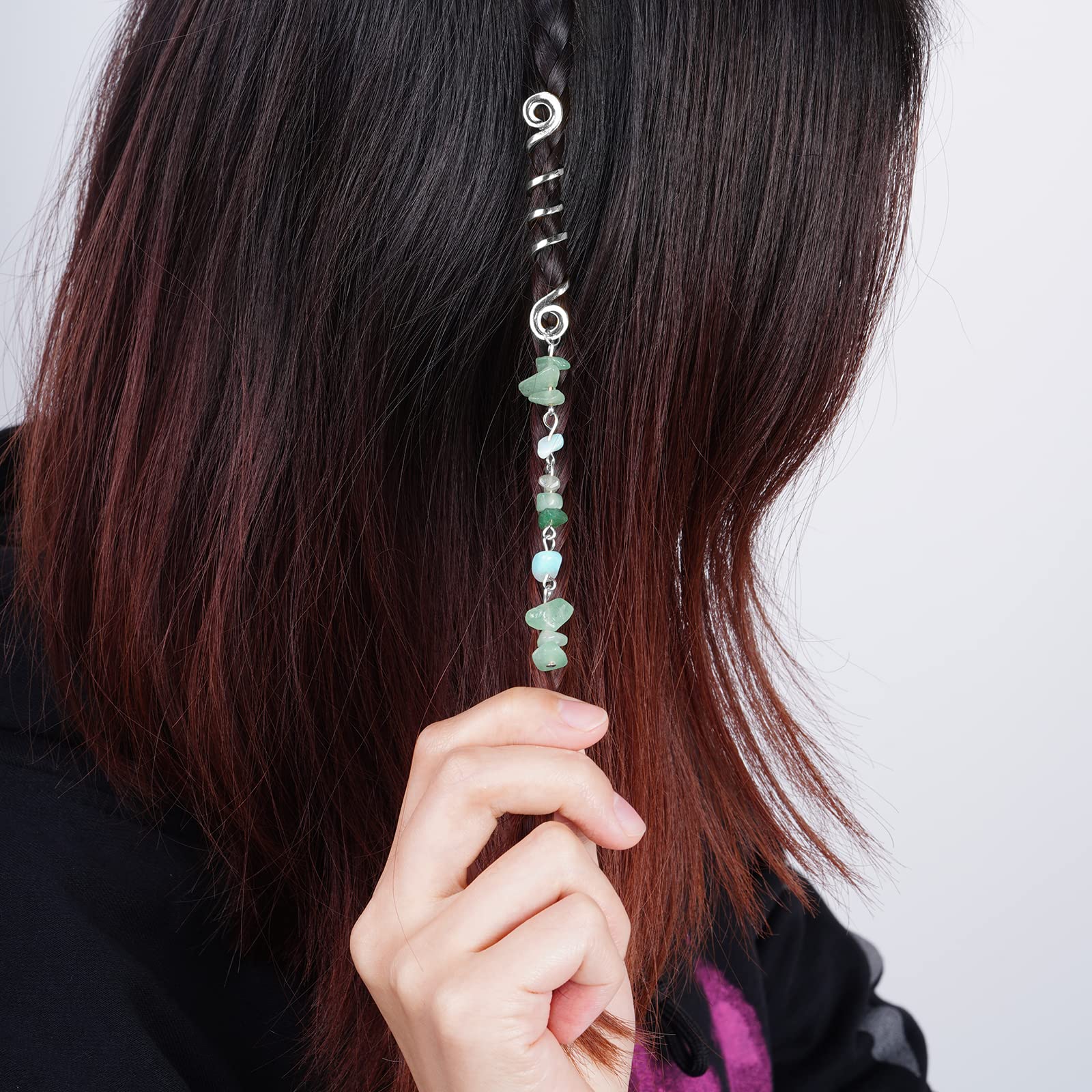 hoyuwak spiral wrapping a dreadlock in use demonstrating secure hold