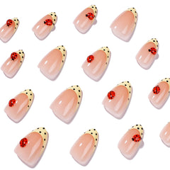 HPYFOI yellow polka dot French tip close-up showing neat edges and vibrant color