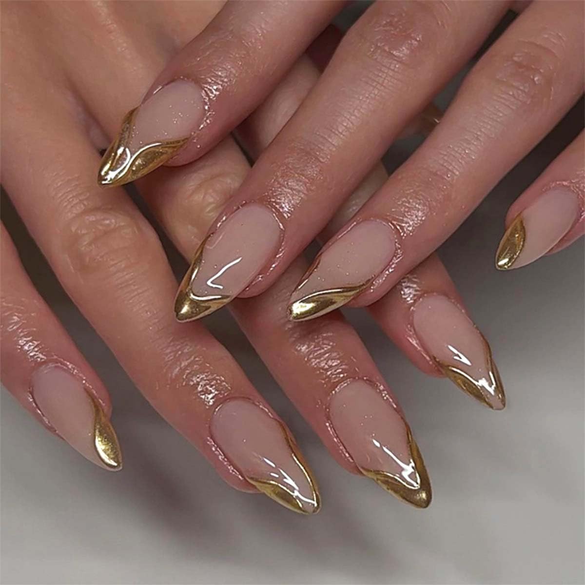 HPYFOI front packaging showing glossy gold almond press-on nails and benefits of quick application