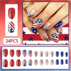 Hrnsnails close-up of red white stars and glitter design for vibrant festive look