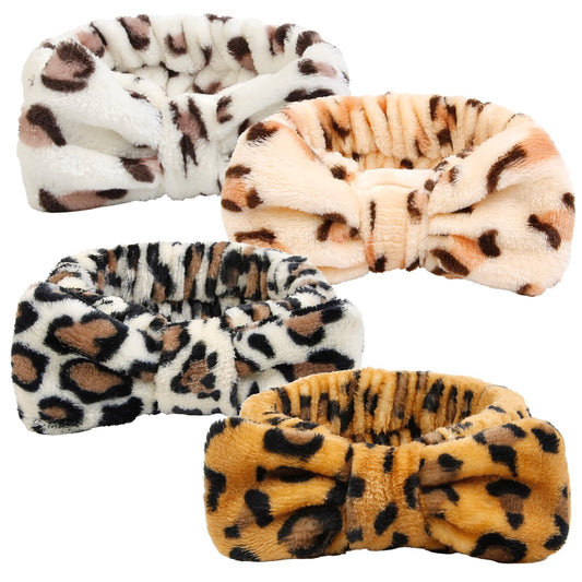 Huachi front view cheetah headband shows pattern and keeps hair tidy