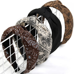 Huachi front view of 4-piece headband set shows patterns and styling benefit