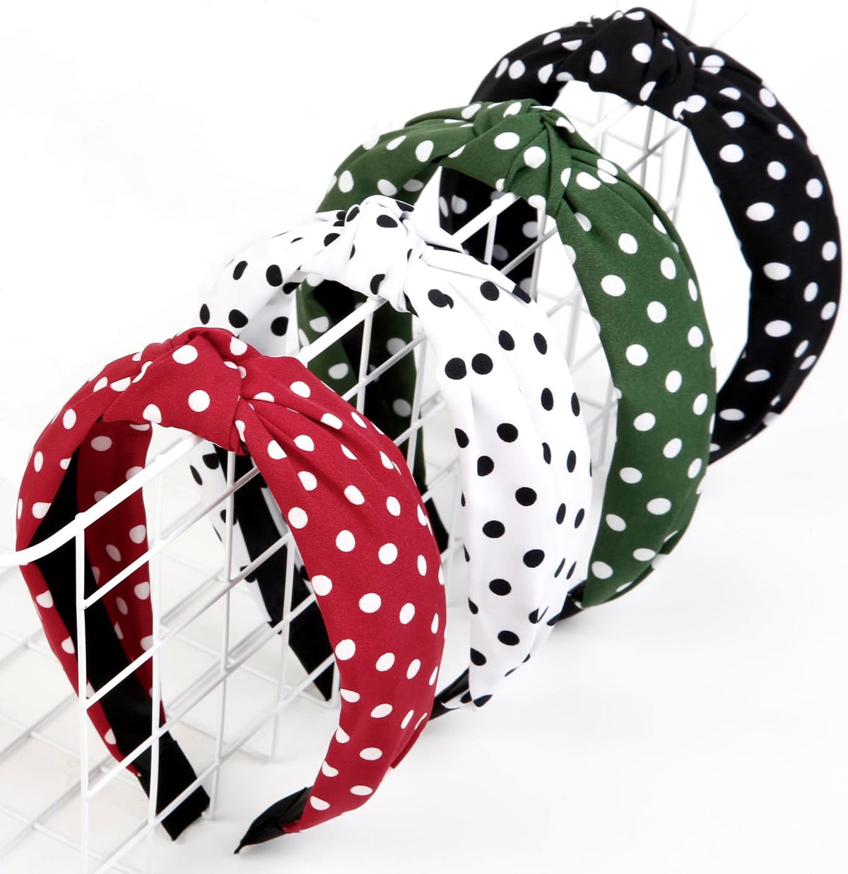 Huachi front view of four polka dot headbands showing color variety and complete set