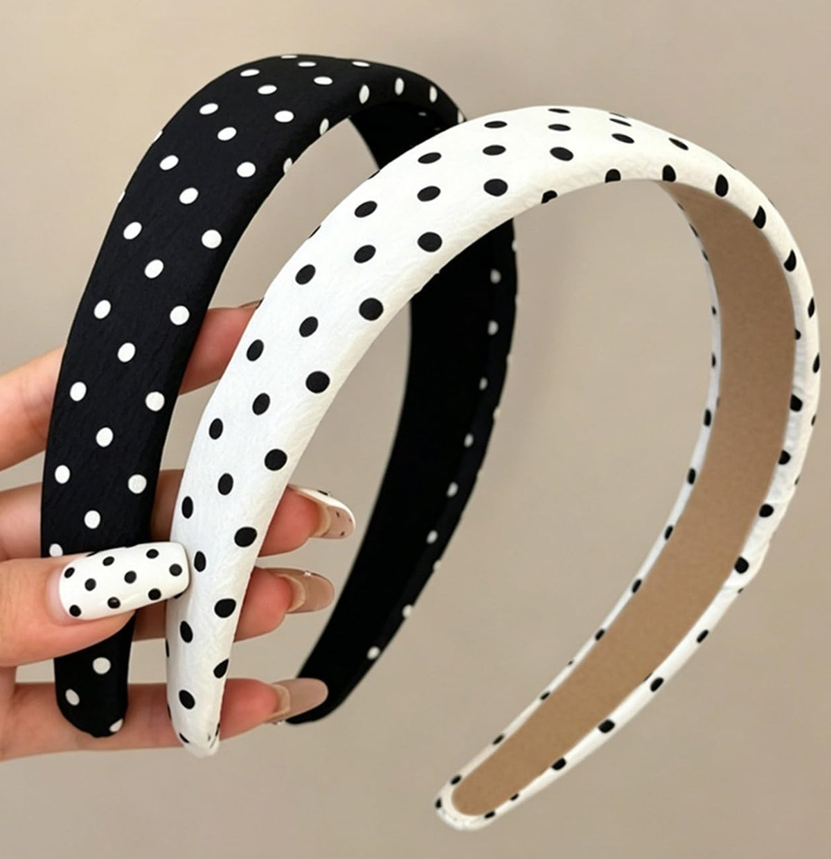 Huachi front view of two polka dot headbands showing pattern and packaging benefit