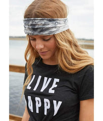 Huachi headband worn during yoga showing non‑slip fit and hair kept away from face