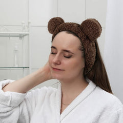 Huachi styled on bathroom vanity suggesting a tidy skincare routine and charm