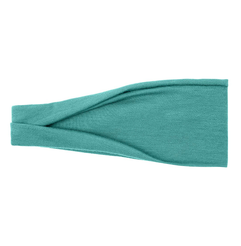 Huachi headband styled at beach showing casual look and sun-ready control