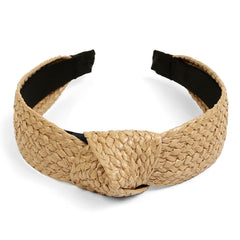 Huachi headband on model at beach demonstrating effortless boho styling and sun-ready look