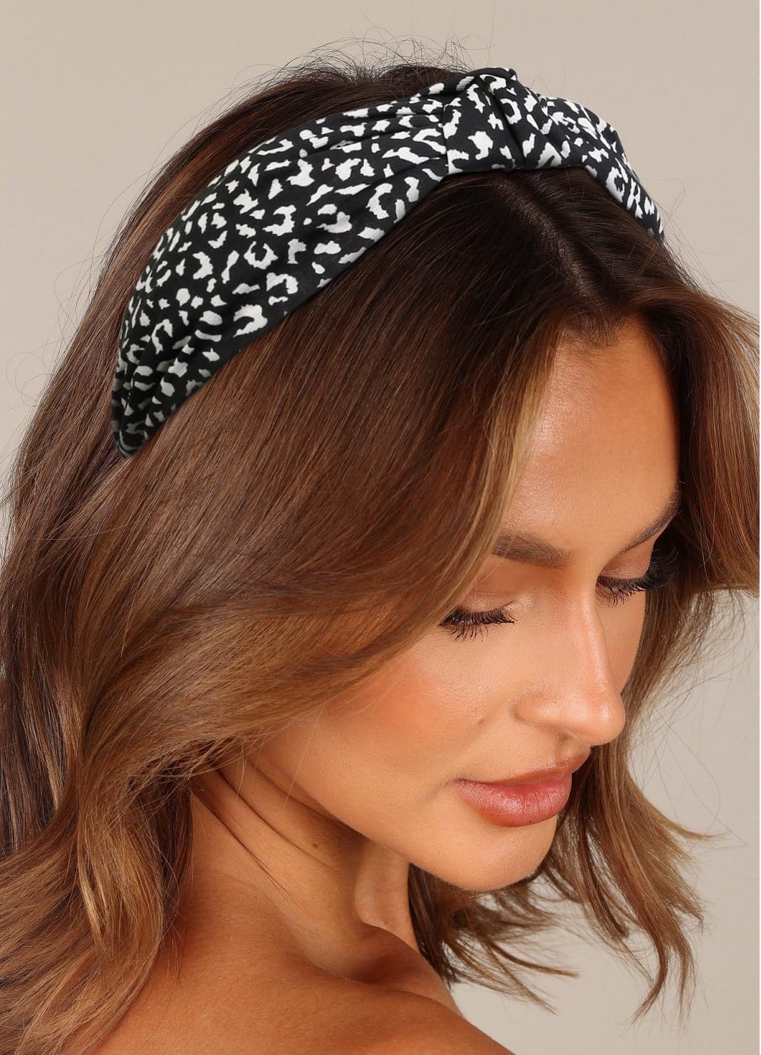 Huachi model wearing black headband showing comfortable secure fit