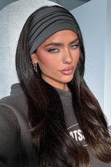 Huachi headband stretched to show size and elastic fit for most heads
