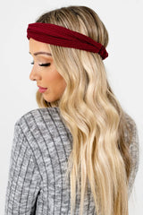 Huachi headband stretched on hand illustrating flexible, comfy fit