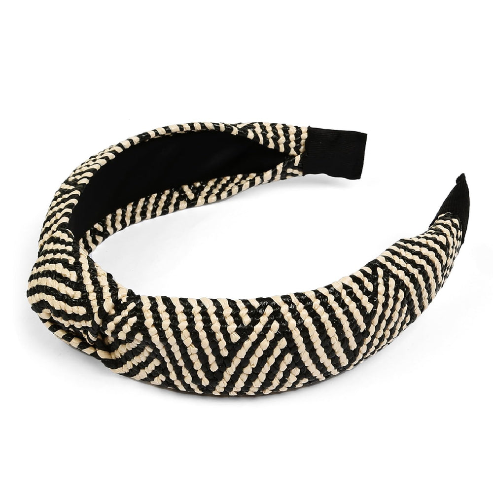 Huachi headband paired with a straw bag illustrating coordinated resort and vacation outfit