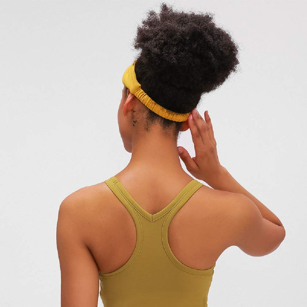 Huachi worn in yoga session showing sweat control and stability