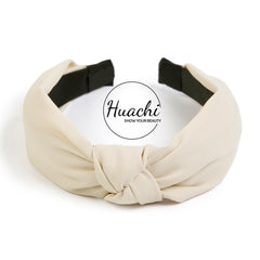 Huachi worn on short hair demonstrating secure hold and tidy bangs benefit