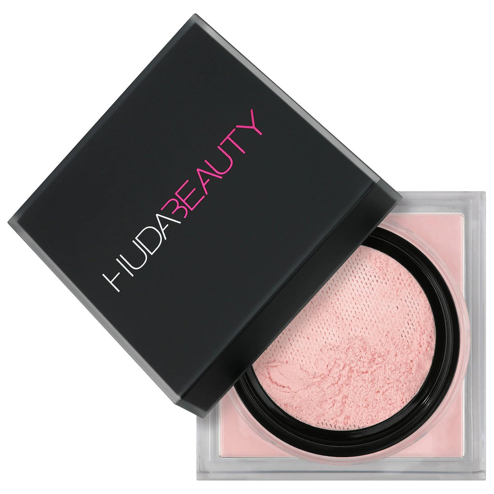 HUDA Beauty open sifter revealing finely milled Cherry Blossom powder texture and control