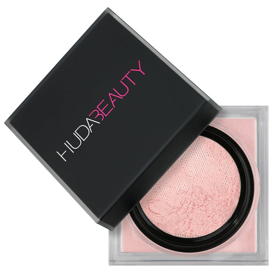 HUDA Beauty open sifter revealing finely milled Cherry Blossom powder texture and control
