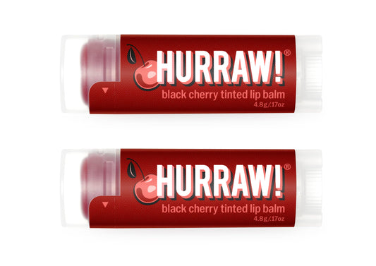 Hurraw! front packaging showing two tinted balm tubes and organic promise