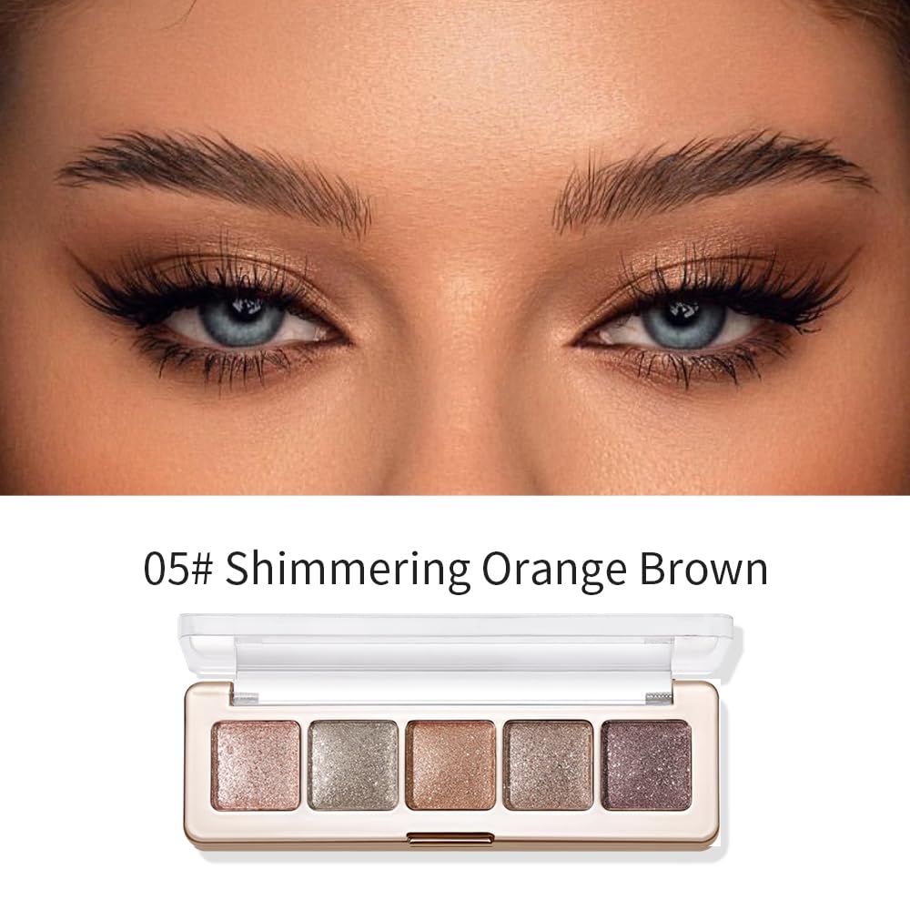 Hxssll fingertip pressing glitter onto eyelid demonstrating high payoff