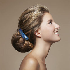 IAXSEE worn in half-up hairstyle adding polished, vintage flair